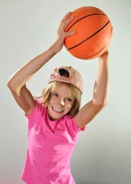 Child exercising with a ball Stock Photos
