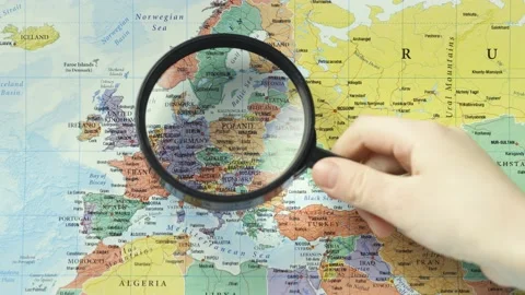 Child explores Europe on map Stock Footage 151114772