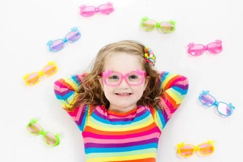 Child at eye sight test. Kid at optitian. Eyewear for kids. Stock Photos