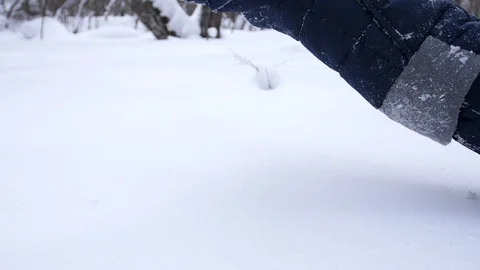 A child fall in the snow in slowmotion. Snow storm. Sports outdoors. Active Vidéo 123580485