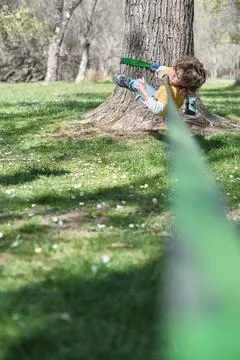 A Child falling while trying to walk on slackline Stock Photos