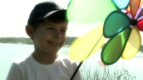 Child with a fan. Stock Footage 10999732