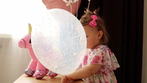 Child with a festive balloon Stock Footage 310692793