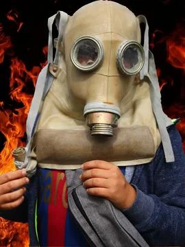 Child-on-fire-on-war Stock Photos