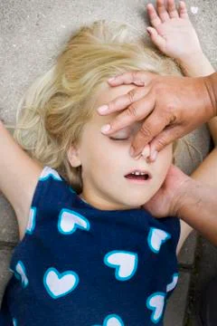 Child first aid Stock Photos