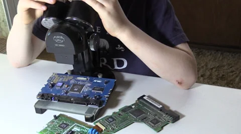 Child, first encounter with microscope, learning Stock Footage 37978678