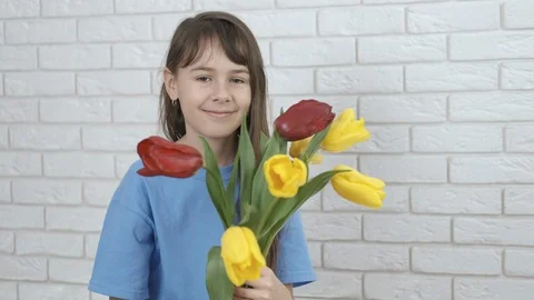 A child with flowers. Stock Footage 104900115