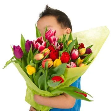 Child with flowers Stock Photos