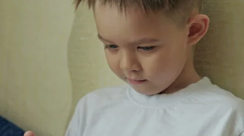 Child focused on screen tablet. Stock Footage 61445500