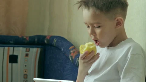 Child focused on screen tablet. Stock Footage 61445752