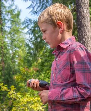 Child geocaching Stock Photos