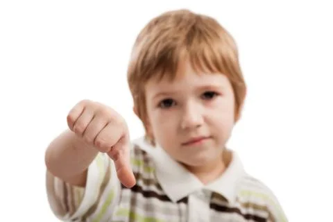 Child gesturing thumb down Stock Photos