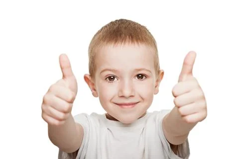 Child gesturing thumb up Stock Photos