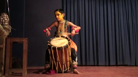 Child getting ready for Kathakali dances theatrical with tambour Stock Footage 52158802