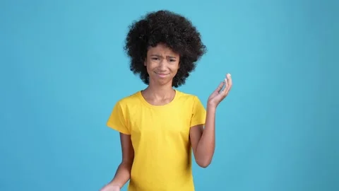 Child girl accuse mind wrong decision isolated blue color background Stock Footage 169237564