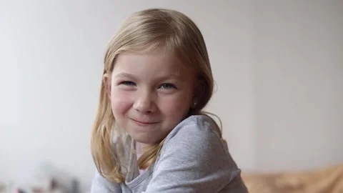 Child girl smiling making faces, fooling around. Stock Footage 239102995