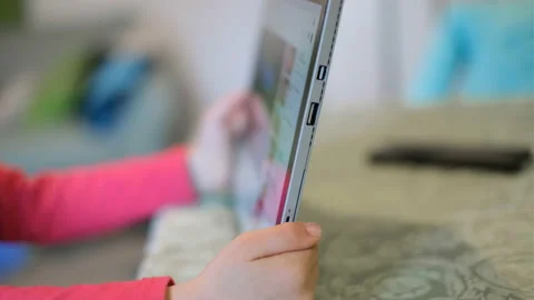 Child girl use tablet for browsing video platform,kids education technology Stock Footage 152767568