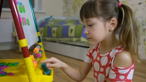 Child girl using abacus to learn numbers and account at home Stock Footage 145633295
