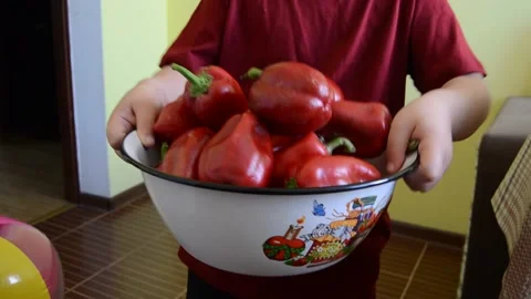 Child gives pepper Stock Footage 141377828