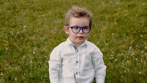 Child in glasses Stock Footage 93345825
