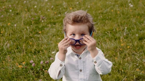 Child in glasses Stock Footage 93353123