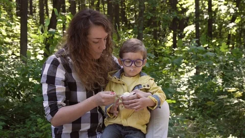 Child in glasses with mom Stock Footage 93301599