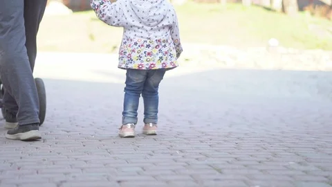 The child goes next to dad Stock Footage 109158384