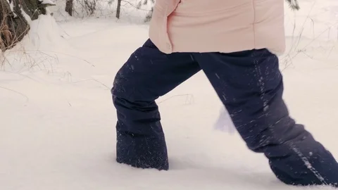 Child going through deep snow. Stock Footage 101051535