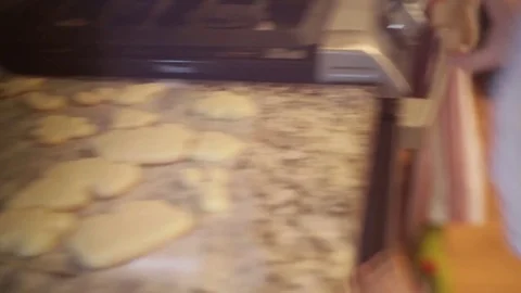 Child Grabbing Cookie off Kitchen Counter Stock Footage 83793638