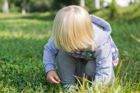 The child on the grass. Stock Photos