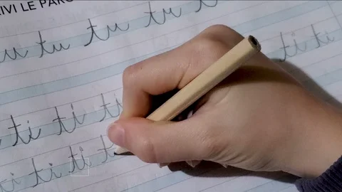 Child hand close up writing,doing primary school homework,education school 4k Stock Footage 125904949