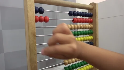 Child hand counting on calculating frame Stock Footage 110625204