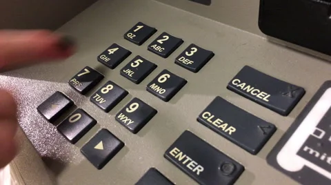 Child hand entering pin code at ATM Stock Footage 63339851
