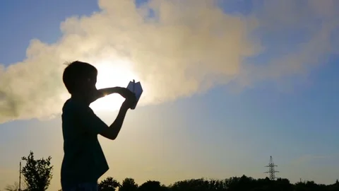 Child Hand With Paper Plane Stock Footage
