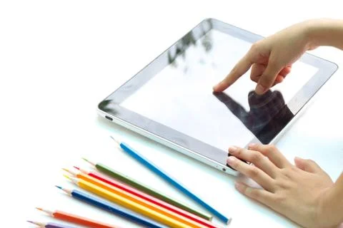 Child hand touch screen tablet Stock Photos
