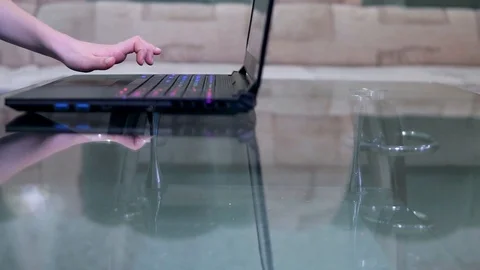 Child hand typing on laptop Stock Footage 122285653