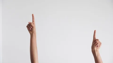 Child hands fingers pointing up to empty white background. Stock Footage 127460284