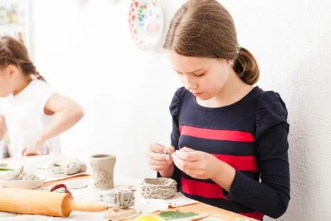 Child hands with plasticine Stock Photos
