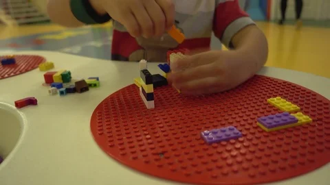 Child hands playing with construction blocks Stock Footage 92217407