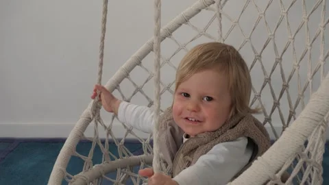 Child Happily Swing Stock Footage 303498784