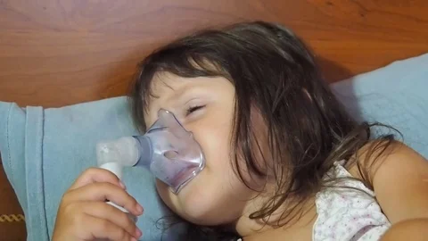 The child has asthma. Stock Footage 79975940