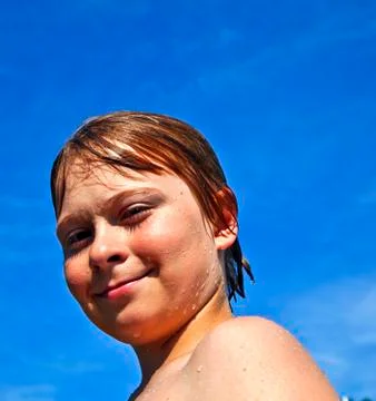 Child has fun in the pool Stock Photos