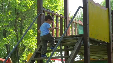 Child having fun in playground 库存影片 50084567
