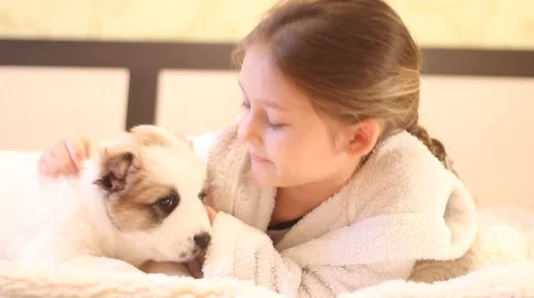 Child having fun playing puppy Видео 44759066