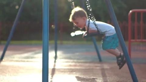 Child having fun on the swing Stock Footage 79976301