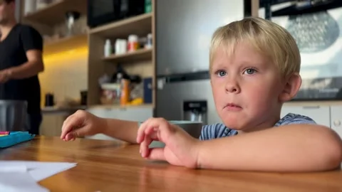 Child having a snack in the kitchen Stock Footage 310169157