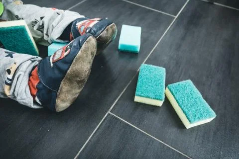 Child help spring cleaning Stock Photos