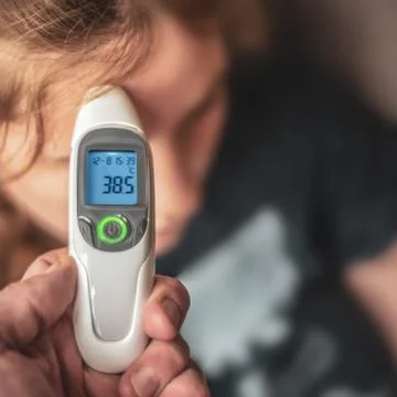 Child With A High Temperature Stock Photos