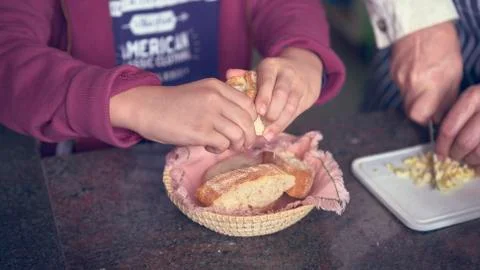 Child holding bread Stock Photos