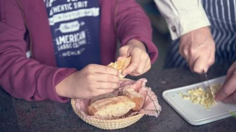Child holding bread Stock Photos